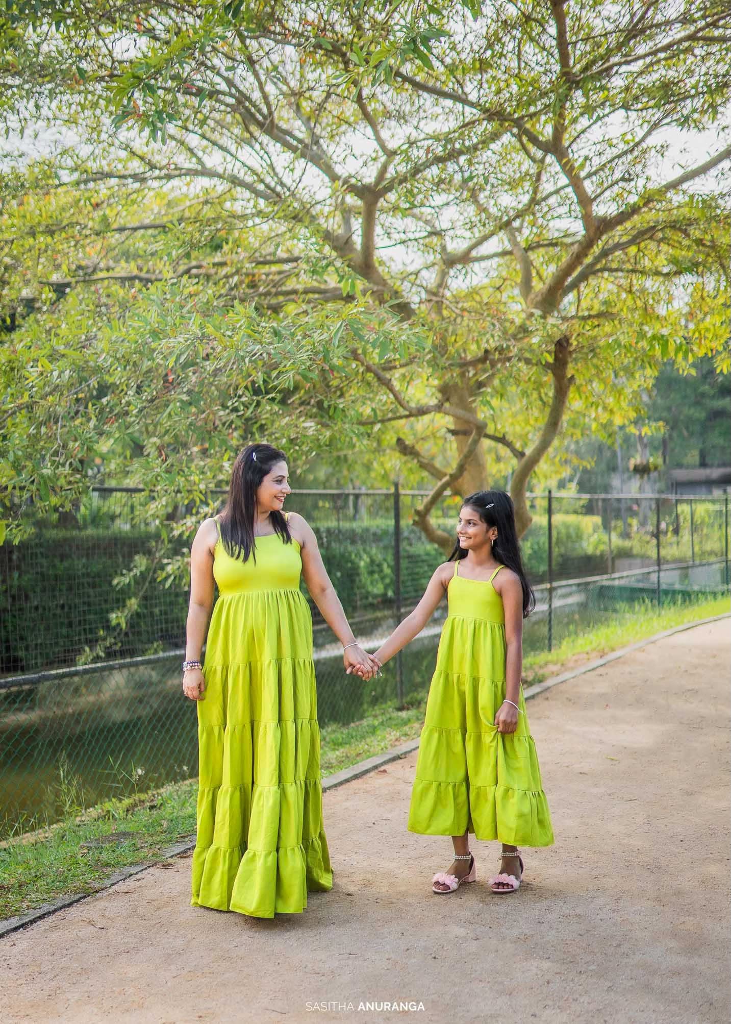 Mother and daughter birthday photoshoot walking in matching green dresses, Colombo, Sri Lanka
