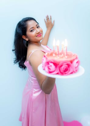 21st birthday photoshoot portrait with a lit birthday cake in Colombo, Sri Lanka