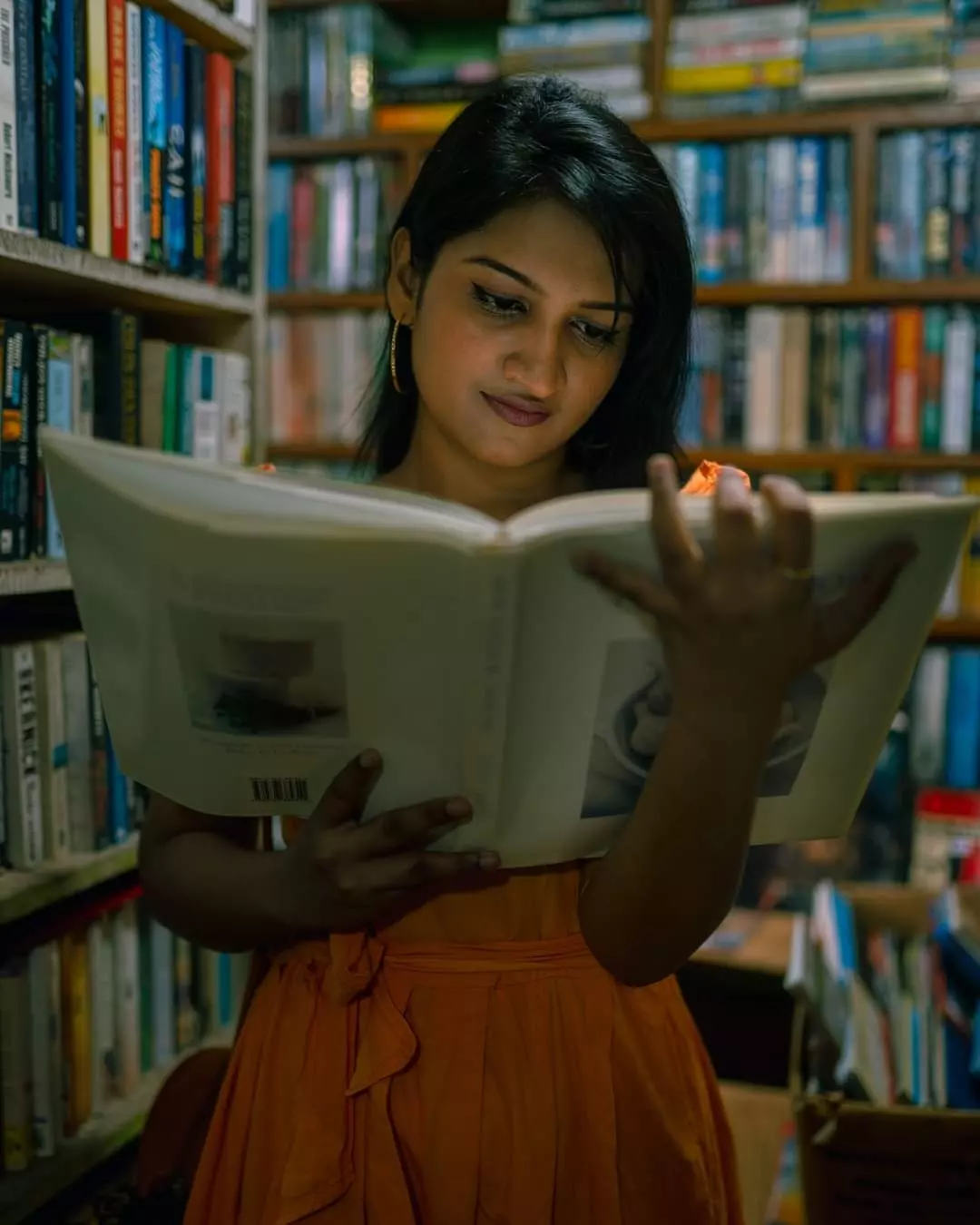 Fashion editorial photography with a book in a bookstore, Colombo, Sri Lanka