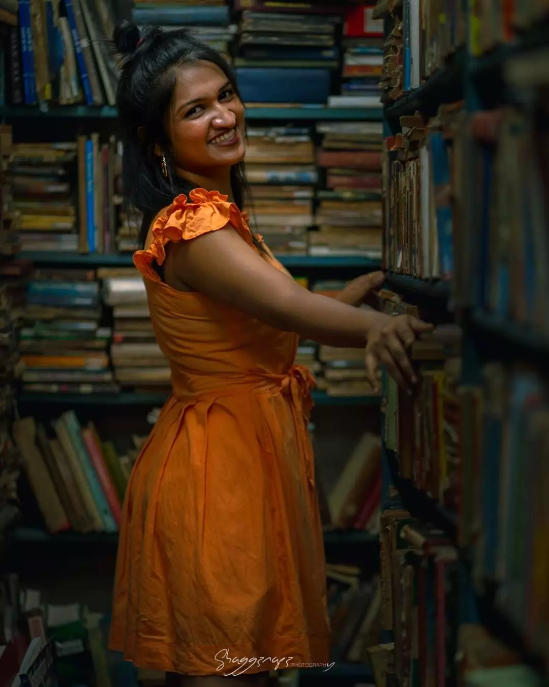 Fashion editorial photoshoot among bookshelves in Colombo, Sri Lanka