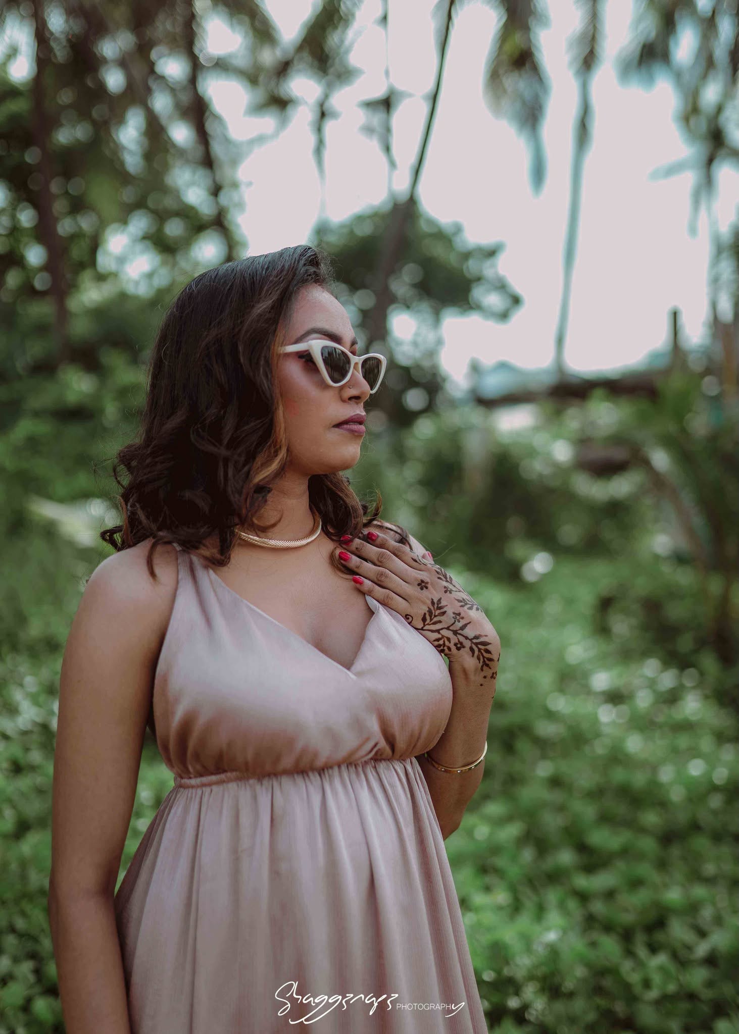 Commercial fashion portrait with sunglasses in a tropical garden, Colombo, Sri Lanka