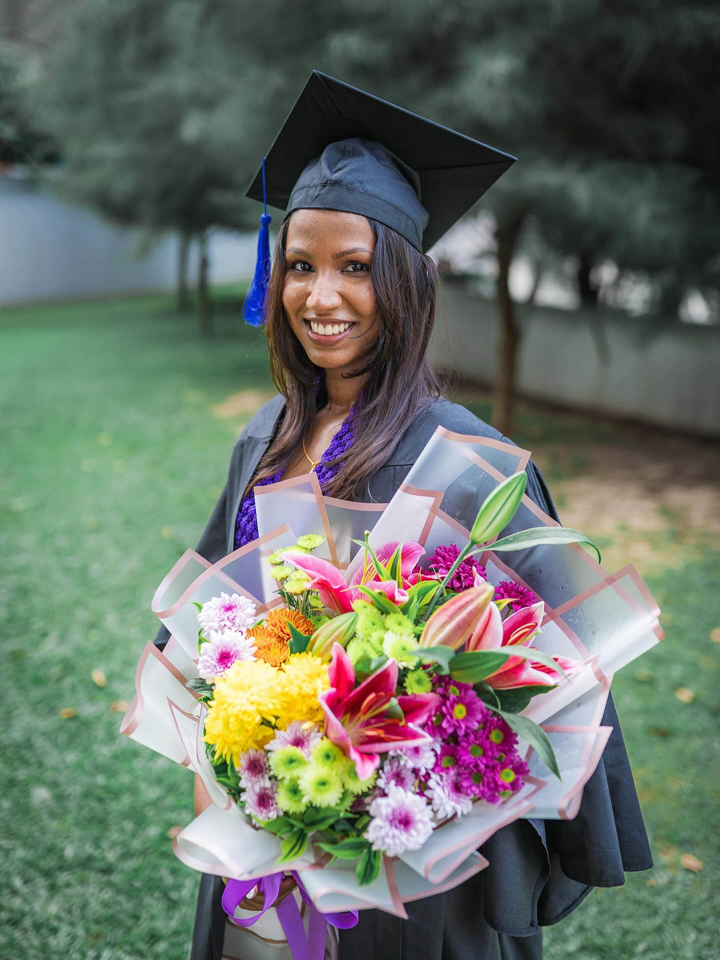 Close-up graduation portrait photography with a flower bouquet in Colombo, Sri Lanka